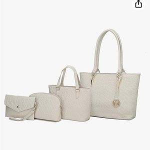 NWOT. MKF Collection  4 handbags